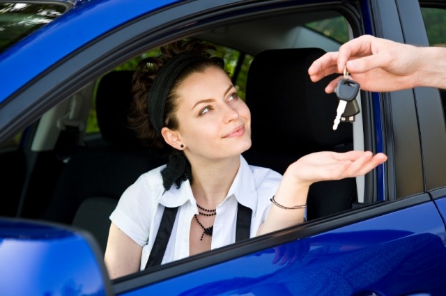 Woman with car keys